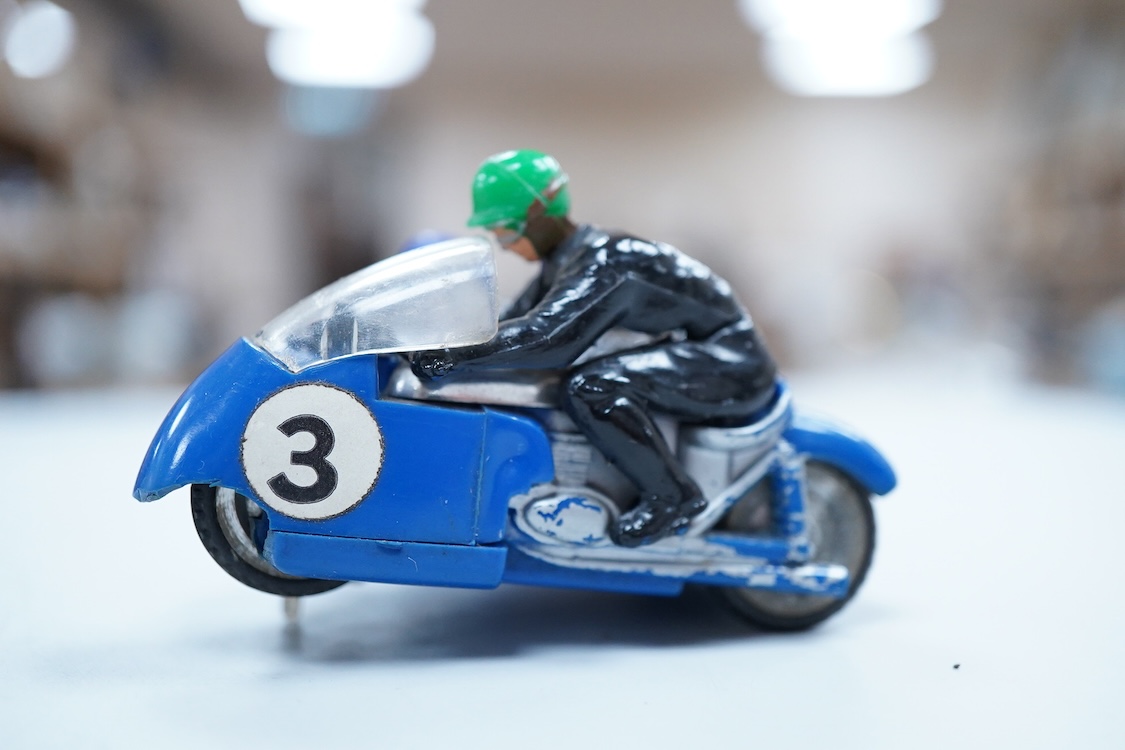 A boxed Tri-ang Scalextric T. C. Seat 600 (C-31) in red, with correct red spot box, together with an unboxed Hurricane combination motorcycle and sidecar MM/82